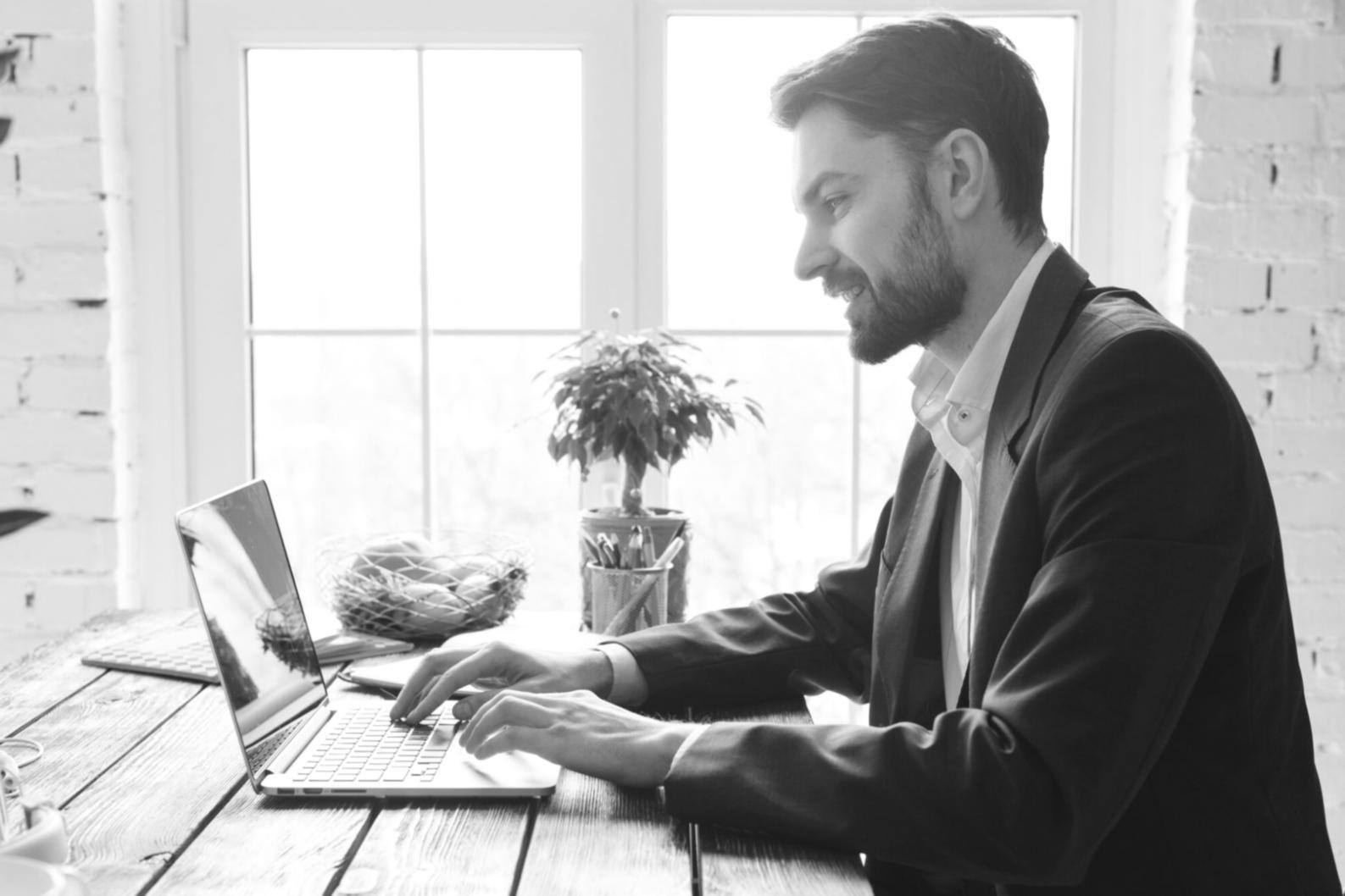Person successfully managing their finances using digital budgeting tools